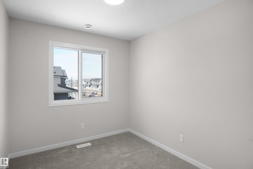 7002 50A Avenue, Beaumont, AB - Indoor Photo Showing Other Room
