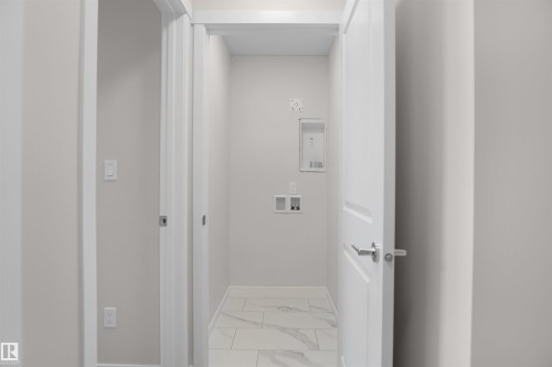 7002 50A Avenue, Beaumont, AB - Indoor Photo Showing Other Room