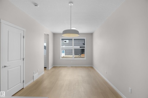 7002 50A Avenue, Beaumont, AB - Indoor Photo Showing Other Room