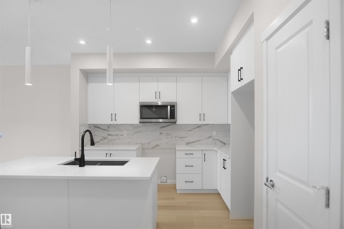7002 50A Avenue, Beaumont, AB - Indoor Photo Showing Kitchen