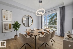 Bright dining area featuring a contemporary chandelier, wood-finish flooring, and a large window - 