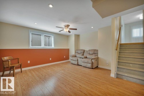 Finished room featuring wood-finish flooring, recessed lighting, and a ceiling fan with light fixture - 18227 76 Avenue, Edmonton, AB - Indoor Photo Showing Other Room