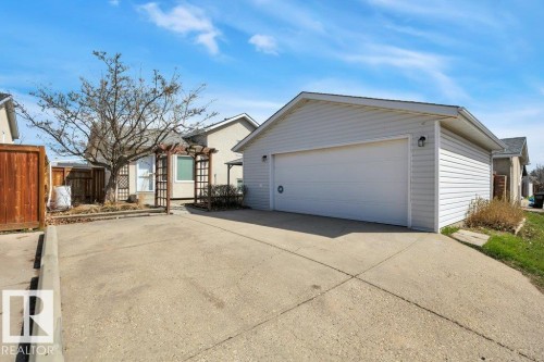 Detached two-car garage with white siding - 18227 76 Avenue, Edmonton, AB - Outdoor