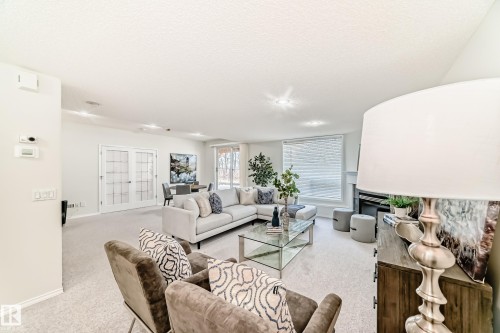 38 920 119 Street, Edmonton, AB - Indoor Photo Showing Living Room With Fireplace