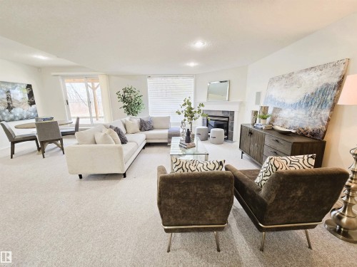 38 920 119 Street, Edmonton, AB - Indoor Photo Showing Living Room With Fireplace