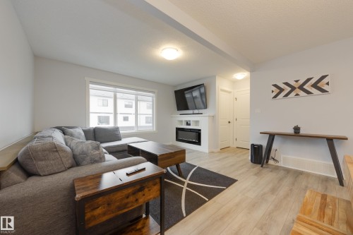 19620 27 Avenue, Edmonton, AB - Indoor Photo Showing Living Room With Fireplace