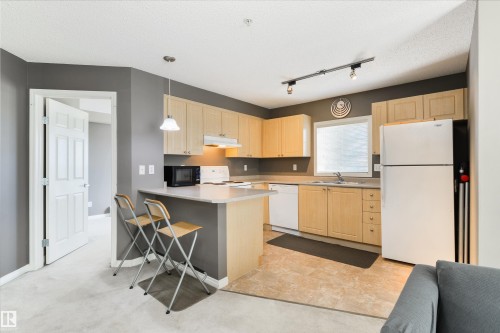 202 622 Mcallister Loop, Edmonton, AB - Indoor Photo Showing Kitchen With Double Sink