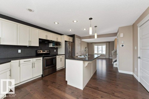 2146 Trumpeter Way, Edmonton, AB - Indoor Photo Showing Kitchen With Upgraded Kitchen