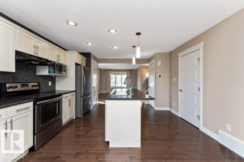 2146 Trumpeter Way, Edmonton, AB - Indoor Photo Showing Kitchen With Upgraded Kitchen