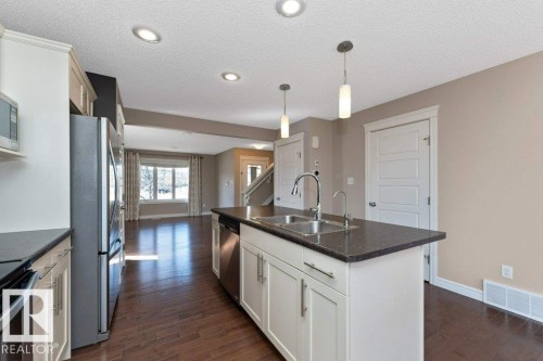 2146 Trumpeter Way, Edmonton, AB - Indoor Photo Showing Kitchen With Double Sink With Upgraded Kitchen