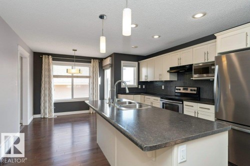 2146 Trumpeter Way, Edmonton, AB - Indoor Photo Showing Kitchen With Double Sink With Upgraded Kitchen
