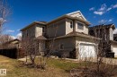 Two-story residence featuring light-colored siding and a multi-gabled roofline - 55 Lamplight Cove, Spruce Grove, AB  - Outdoor 