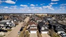 Residential neighborhood featuring numerous single-family homes with pitched roofs and attached garages - 55 Lamplight Cove, Spruce Grove, AB  - Outdoor With View 
