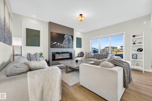 117 Kidd Crescent, Leduc, AB - Indoor Photo Showing Living Room With Fireplace