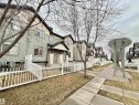Row of townhomes featuring light siding and dark shingle roofs - 97 465 Hemingway Road, Edmonton, AB  - Outdoor 