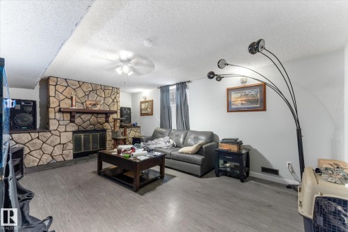 4520 54 Avenue, Leduc, AB - Indoor Photo Showing Living Room With Fireplace