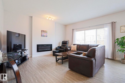 7314 Edgemont Way, Edmonton, AB - Indoor Photo Showing Living Room With Fireplace
