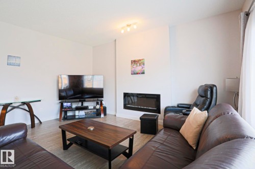 7314 Edgemont Way, Edmonton, AB - Indoor Photo Showing Living Room With Fireplace