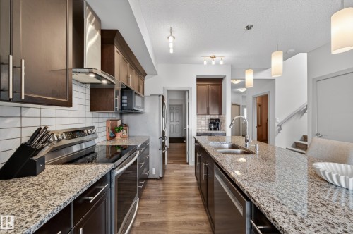 934 Berg Place, Leduc, AB - Indoor Photo Showing Kitchen With Stainless Steel Kitchen With Double Sink With Upgraded Kitchen