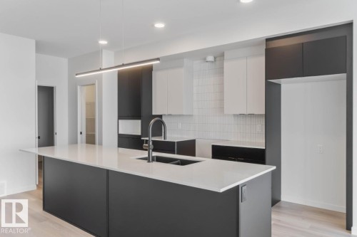 56 Gambel Loop, Spruce Grove, AB - Indoor Photo Showing Kitchen With Double Sink