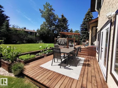 Expansive wood-finish deck with multiple levels - 12423 28A Avenue, Edmonton, AB - Outdoor With Deck Patio Veranda With Exterior