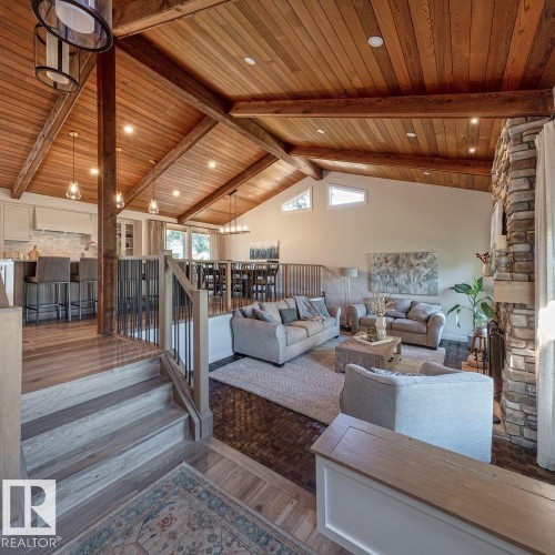 Vaulted wood-finish ceilings with exposed beams - 12423 28A Avenue, Edmonton, AB - Indoor