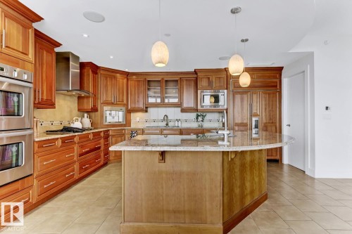 1900 10035 Saskatchewan Drive, Edmonton, AB - Indoor Photo Showing Kitchen With Double Sink