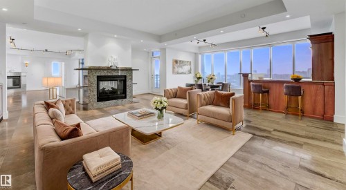 1900 10035 Saskatchewan Drive, Edmonton, AB - Indoor Photo Showing Living Room With Fireplace
