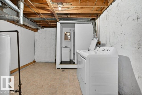 Functional utility space featuring tile flooring, exposed ceiling joists, and a dedicated laundry area - 3E Twin Terrace, Edmonton, AB - Indoor Photo Showing Laundry Room