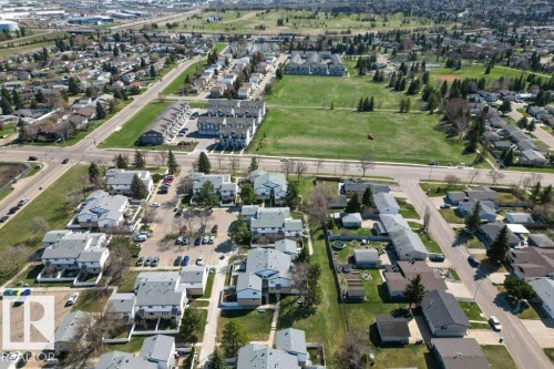 Aerial perspective showcasing residential properties and community green spaces - 3E Twin Terrace, Edmonton, AB - Outdoor With View