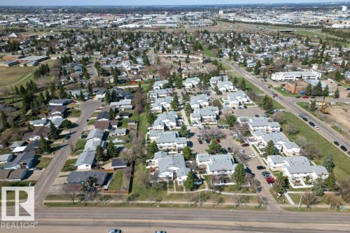 Aerial perspective showcasing a residential area with various housing types - 3E Twin Terrace, Edmonton, AB - Outdoor With View