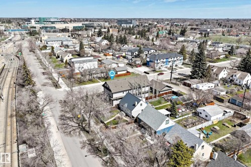 Aerial perspective showcasing the subject property's roofline and surrounding urban landscape - 10519 114 Avenue, Edmonton, AB - Outdoor With View
