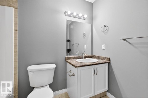 Bathroom featuring vanity and toilet - 150 Acacia Circle, Leduc, AB - Indoor Photo Showing Bathroom