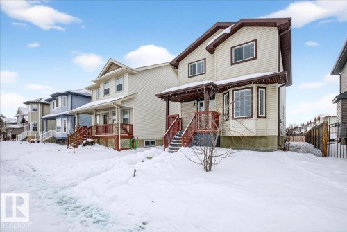 View of front of home featuring covered porch - 150 Acacia Circle, Leduc, AB - Outdoor