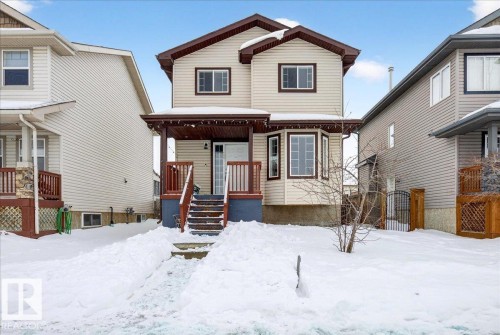 View of front of home with a gate - 150 Acacia Circle, Leduc, AB - Outdoor With Facade