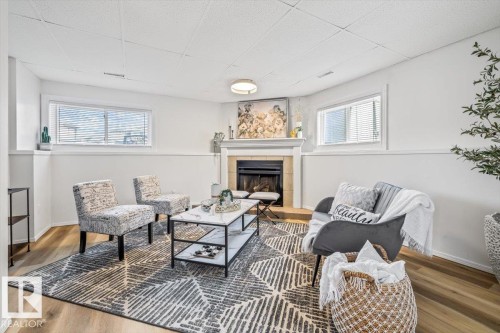 9347 180A Avenue, Edmonton, AB - Indoor Photo Showing Living Room With Fireplace