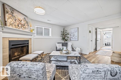 9347 180A Avenue, Edmonton, AB - Indoor Photo Showing Living Room With Fireplace