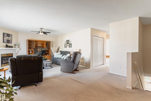 26 11 Hunchak Way, St. Albert, AB - Indoor Photo Showing Living Room With Fireplace