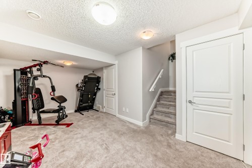 18127 77 Street, Edmonton, AB - Indoor Photo Showing Gym Room