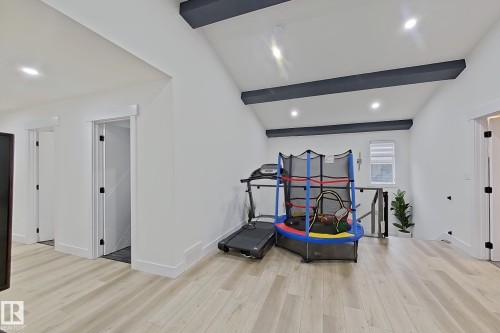 Vaulted ceiling with exposed dark wood beams - 1210 Peregrine Terrace, Edmonton, AB - Indoor