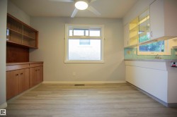 Neutral wall paint with light wood-finish flooring - 