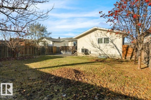 Back of property featuring a fenced backyard and a wooden deck - 3515 20 Avenue, Edmonton, AB - Outdoor
