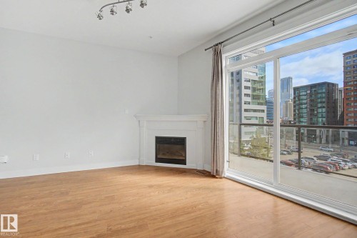 411 10033 110 Street, Edmonton, AB - Indoor With Fireplace