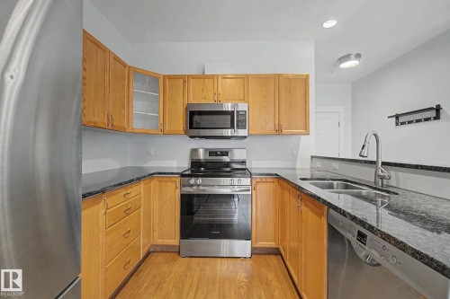 411 10033 110 Street, Edmonton, AB - Indoor Photo Showing Kitchen With Double Sink