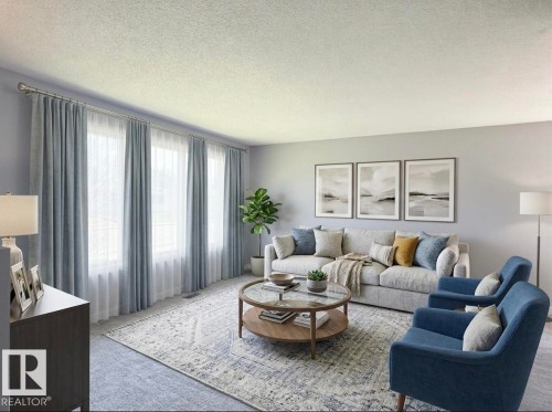 Bright living room featuring three large windows with layered drapery - 3912 108 Street, Edmonton, AB - Indoor Photo Showing Living Room