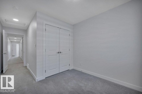 46 603 Orchards Boulevard, Edmonton, AB - Indoor Photo Showing Other Room