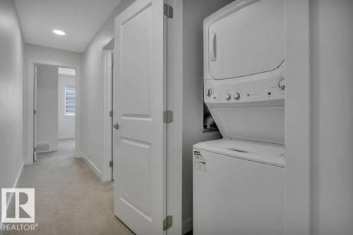 46 603 Orchards Boulevard, Edmonton, AB - Indoor Photo Showing Laundry Room
