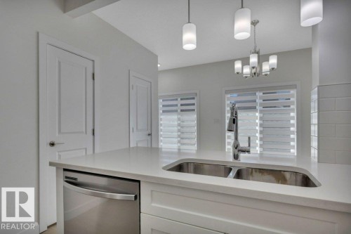 46 603 Orchards Boulevard, Edmonton, AB - Indoor Photo Showing Kitchen With Double Sink