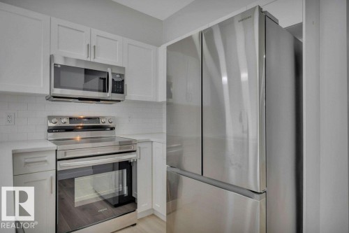 46 603 Orchards Boulevard, Edmonton, AB - Indoor Photo Showing Kitchen With Stainless Steel Kitchen