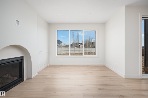 157 Graybriar Drive, Stony Plain, AB - Indoor Photo Showing Other Room With Fireplace